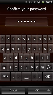 Key in the phone lock code again and press OK.