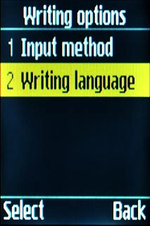 Scroll to Writing language and press the Navigation key.
