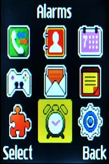 Scroll to Alarms and press the Navigation key.