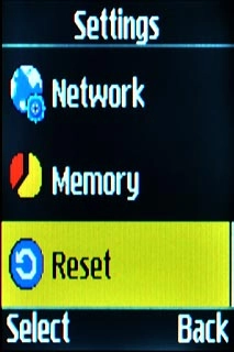 Scroll to Reset and press the Navigation key.