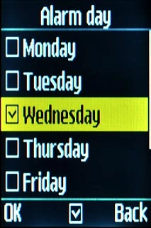 Highlight the required day and press the Navigation key.