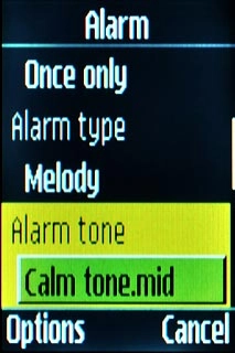 Scroll to Alarm tone and press the Navigation key.