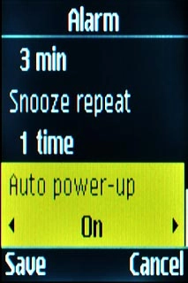 Scroll to Auto power-up and press Navigation key right to select On or Off.