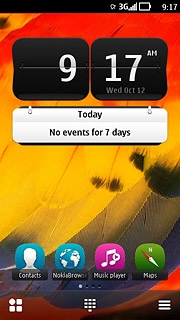 The alarm icon shows that the alarm is set.Further information:Set the alarm
