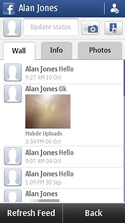 Press the Wall or Info tab.