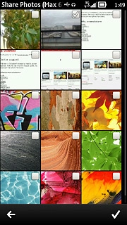 When a picture is ticked (V), it's selected.