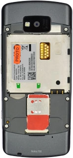 Place your SIM as illustrated next to the SIM holder.Slide your SIM into the SIM holder.