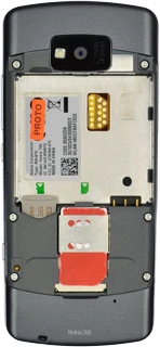 Turn the memory card as illustrated in your phone.Slide your memory card into the holder.