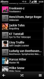 To select a playlist:Press the menu icon.