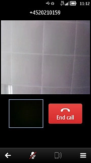 To turn the camera on or off:Press the menu icon.