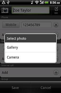 To take a new picture:Press Camera.
