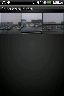 Go to the required folder.Press the required picture.