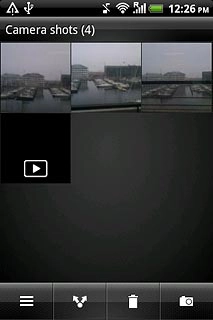 Go to the required folder.Press and hold the required picture or the required video clip until a pop-up menu is displayed.