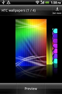 Slide your finger right or left on the display to select the required background image.