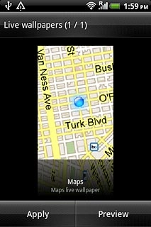 Slide your finger right or left on the display to select the required background image.