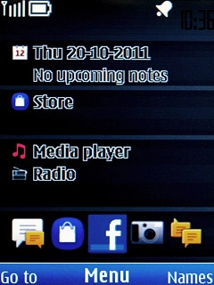 The alarm icon shows that the alarm is set.Further information:Set the alarm