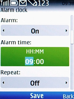 Scroll to Alarm time and key in the required alarm time.