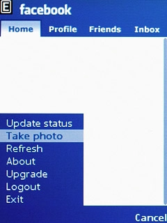 Scroll to Take photo and press the Navigation key.