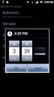 Press + or - next to hours and minutes to set the time.