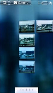 Go to the required folder.Press the required picture or the required video clip.