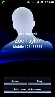 When you have an ongoing call, the new call is signalled by a sound.Press Answer.