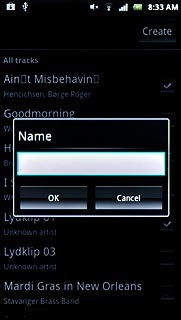 Press the text input field and key in a name for the playlist.