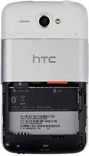 Turn the memory card as illustrated in the memory card holder.Slide the memory card into the holder and press it until it clicks into place.