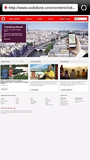 Press the address bar at the top of the display.