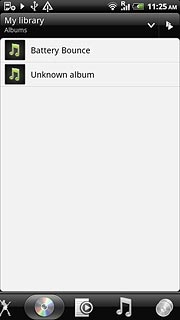 Press the required category at the bottom of the display.Go to the required audio file or playlist.