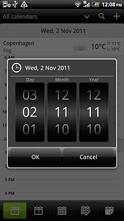 Slide the numbers up or down to select the date.
