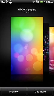 Slide your finger right or left on the display to select the required background image.