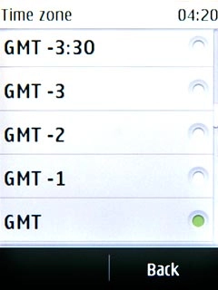 Press the required time zone.