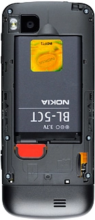 Turn the memory card as illustrated in the memory card holder.Slide the memory card into the memory card holder and press it until it clicks into place.