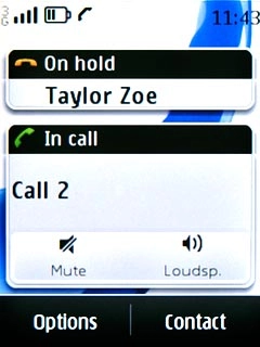 The calls are displayed on a list and the active call is displayed at the bottom.Press the required call to return to swap calls.