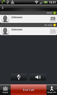 Your calls are displayed on a list and the call on hold is indicated by On hold.Press the required call to select it.