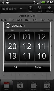 Slide the numbers up or down to select the date.