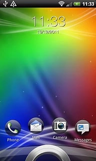 Press the ring at the bottom of the display and drag it upwards.