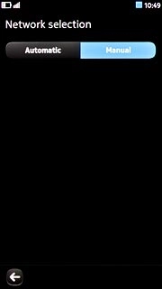 Press Manual.Your phone searches for networks within range.