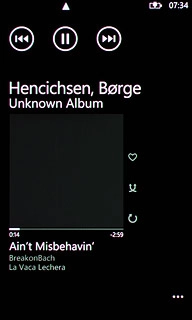 To go to the previous audio file:Press arrow left twice.