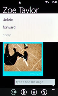 Press and hold the required picture message.Press forward.