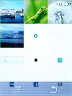 Go to the required folder.Press the required picture or the required video clip.