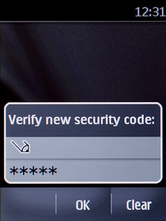 Key in the new phone lock code again and press OK.