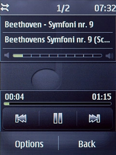 To go to the previous audio file:Press double arrow left.