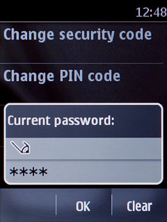 Key in your current barring password (default is 0000) and press OK.