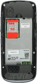 Close the SIM holder and slide it downwards until it's secured.