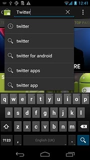Key in Twitter and press the search icon.