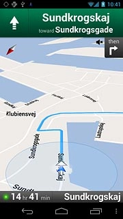 The navigation window with information about your route is displayed.The next turn and the next route detail are displayed at the top of the display.