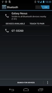 Press SEARCH FOR DEVICES.Your phone now searches for devices and after a moment, a list of Bluetooth devices within range is displayed.