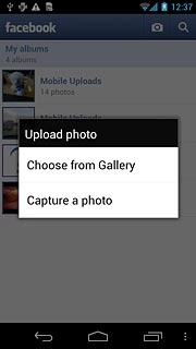 To upload a saved picture:Press Choose from Gallery.