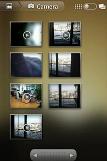 Go to the required folder.Press and hold the required picture or the required video clip until the picture or video clip is ticked (V).